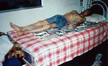 杨建坡2004年2月在唐山开平劳教所遭迫害，体重锐减100斤，释放回家时仅剩80多斤