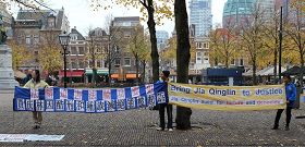 迫害法轮功的元凶贾庆林在荷兰再被起诉（图）