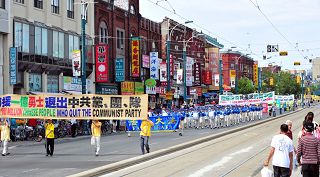 多伦多各界声援一亿中国人退出中共及其组织，举办游行集会。