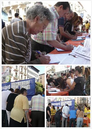 '图2：萨拉戈萨市民和游客们纷纷签名声援法轮功反迫害'