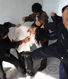 2013-9-24-minghui-torture-beating--ss.jpg