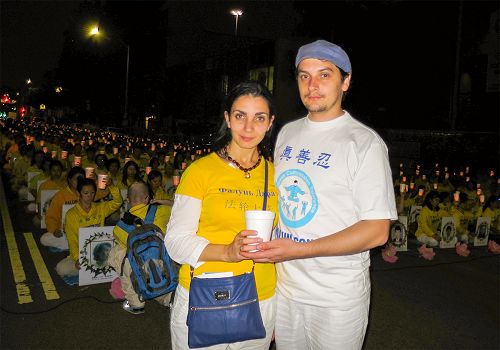 图8：来自乌克兰的法轮功学员AleksandrNimenko和妻子Armina
