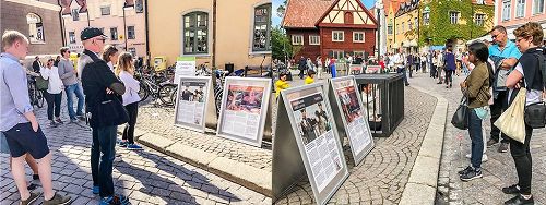 '图3：来参加瑞典榆树谷公园周的人们正在仔细阅读展板，了解法轮功真相。'