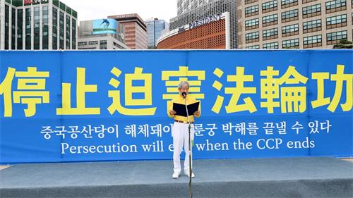 '图13：社团法人韩国法轮大法佛学会会长权洪大发表声明。'