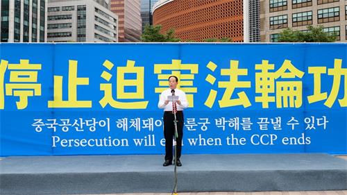 '图15：中国民主运动海外联席会议韩国分部代表武振荣发表演说。'