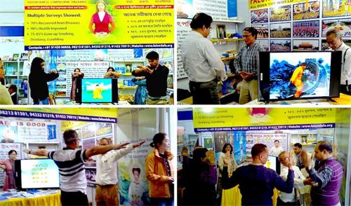 '图1：印度法轮功学员在加尔各答国际书展上教功演示功法'