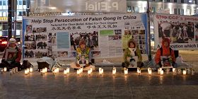 酷刑受害者纪念日，芬兰法轮功学员烛光悼念被迫害致死的同修