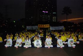 马来西亚学员举办“七二零”烛光悼念活动