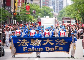 图1：法轮大法天国乐团连续第八年参加蒙特利尔加拿大国庆游行。