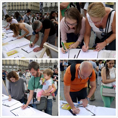 各国民众在马德里市中心太阳广场上签名支持反迫害