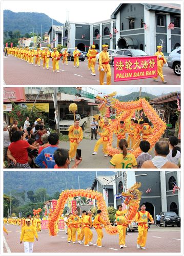 法轮功学员来到劳勿举办首场庆中秋游行，途经劳勿市区主要大道和华人集中区，深受当地居民的欢迎。