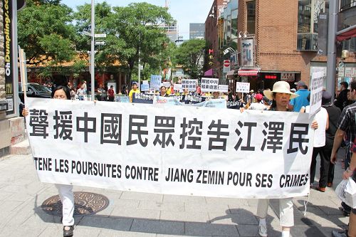 2015-7-5-minghui-falun-gong-montreal-02--ss.jpg