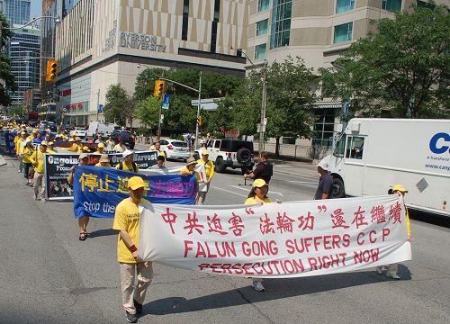 '图1～9：法轮功学员在加拿大多伦多市中心举办盛大游行'