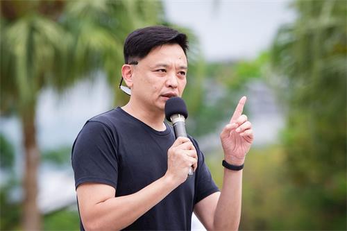 '图7：台北市议员洪健益谴责中共罪行，呼吁国际关注中国人权问题。'