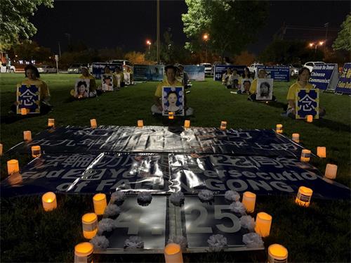 '图1：拉斯维加斯法轮功学员举办烛光守夜，纪念“四·二五”'
