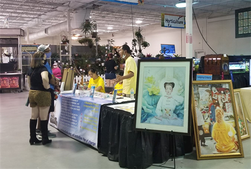 '图1：法轮功学员参加2021年佛州博览会。'