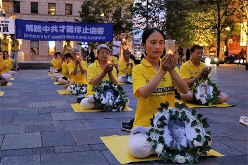 '图5：法轮功学员韩女士参加烛光悼念活动'