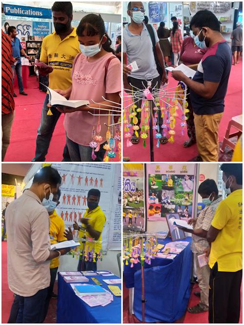 Galle3: 斯里兰卡南部地区的民众驻足法轮功学员的展位阅读法轮功的书籍