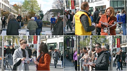 图1～3：二零二二年四月九日，比利时法轮功学员在安特卫普市中心举办讲真相活动，许多人驻足观看、了解。