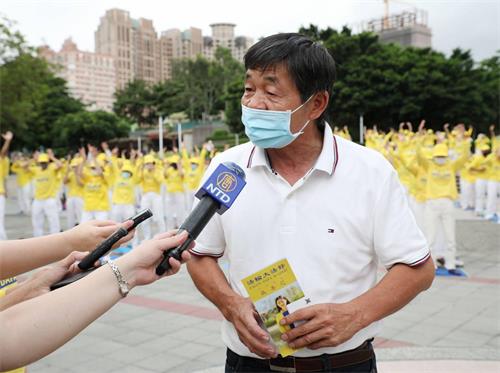 图6: 台中市议员王朝坤认为，支持法轮功反迫害行动相当有意义。